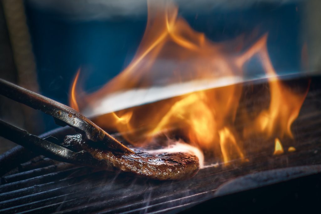 meat on grilling screen